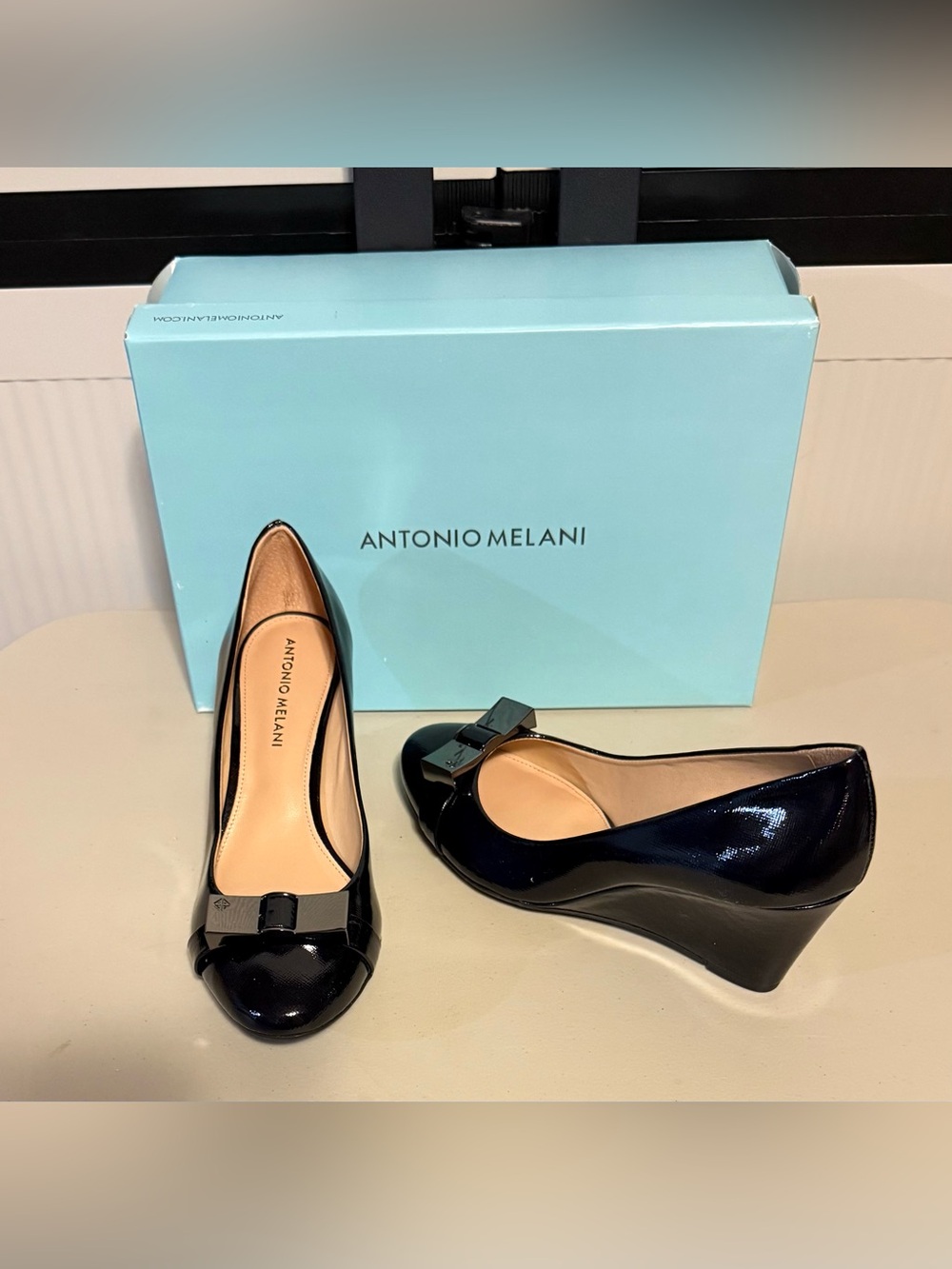 ANTONIO MELANI Black Patent Wedge Pumps with Bow